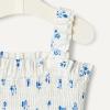 imageAmazon Essentials x Sofia Grainge Baby Girls Woven Sleeveless Ruffle RomperIvory Blue Floral