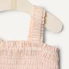 imageAmazon Essentials x Sofia Grainge Baby Girls Woven Sleeveless Ruffle RomperPeach Classic Stripe