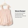 imageAmazon Essentials x Sofia Grainge Baby Girls Woven Sleeveless Ruffle RomperPeach Classic Stripe