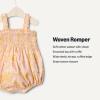 imageAmazon Essentials x Sofia Grainge Baby Girls Woven Sleeveless Ruffle RomperShell Pink Ornate Paisley