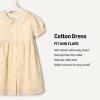 imageAmazon Essentials x Sofia Grainge Toddler and Baby Girls Cotton Sateen Dress with CollarLight Yellow Delicate Floral