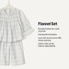 imageAmazon Essentials x Sofia Grainge Toddler and Baby Girls Long Sleeve Flannel SetIvory Light Blue Simple Plaid