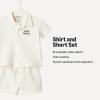 imageAmazon Essentials x Sofia Grainge Toddlers and Baby Boys Cotton Pique Short Sleeve Shirt amp Shorts Play SetIvory Navy Petit Soleil