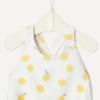 imageAmazon Essentials x Sofia Grainge Toddlers and Baby Girls OnePiece Swimsuit with Crisscross Straps Ruffle DetailIvory Lemon