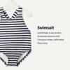 imageAmazon Essentials x Sofia Grainge Toddlers and Baby Girls OnePiece Swimsuit with Crisscross Straps Ruffle DetailIvory Navy Even Stripe