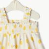 imageAmazon Essentials x Sofia Grainge Toddlers and Baby Girls Smocked Cotton DressIvory Lemon