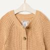 imageAmazon Essentials x Sofia Grainge Unisex Babies Cotton Knit PlaysuitLight Camel