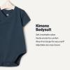 imageAmazon Essentials x Sofia Grainge Unisex Babies Side Snap Short Sleeve BodysuitDark NavyIvoryLight Blue