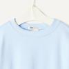 imageAmazon Essentials x Sofia Grainge Unisex Babies Toddlers and Kids Sweatshirt and Shorts French Terry Play SetLight Blue