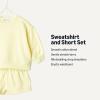 imageAmazon Essentials x Sofia Grainge Unisex Babies Toddlers and Kids Sweatshirt and Shorts French Terry Play SetLight Yellow