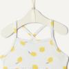 imageAmazon Essentials x Sofia Grainge Toddlers and Baby Girls TwoPiece Swimsuit with Crisscross StrapsIvory Lemon