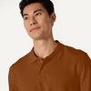 image:imageAmazon Essentials Mens RegularFit Short Sleeve Cotton Pique Polo Shirt Available in Big amp TallCaramel
