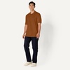 image:imageAmazon Essentials Mens RegularFit Short Sleeve Cotton Pique Polo Shirt Available in Big amp TallCaramel