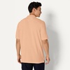 image:imageAmazon Essentials Mens RegularFit Short Sleeve Cotton Pique Polo Shirt Available in Big amp TallPale Peach