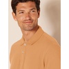 image:imageAmazon Essentials Mens RegularFit Short Sleeve Cotton Pique Polo Shirt Available in Big amp TallTan