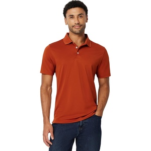 image:imageAmazon Essentials Mens Moisture Wicking Golf Polo Shirt Short Sleeve SlimFit QuickDryBrick Red