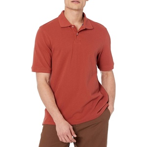image:imageAmazon Essentials Mens RegularFit Short Sleeve Cotton Pique Polo Shirt Available in Big amp TallRust