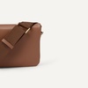 image:imageAmazon Essentials Womens Lightweight Clutch Crossbody BagTan