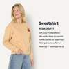 image:imageAmazon Essentials x Sofia Grainge Womens Relaxed Fit Boxy Drop Shoulder Crewneck SweatshirtLight Camel Bear Heart