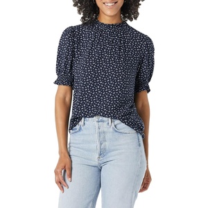 image:imageAmazon Essentials Womens Fluid Twill Short Puff Sleeve Ruffle Smocked ShirtNavy White Ditsy Print