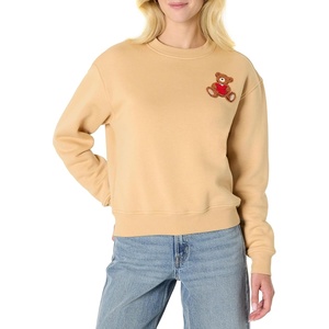 image:imageAmazon Essentials x Sofia Grainge Womens Relaxed Fit Boxy Drop Shoulder Crewneck SweatshirtLight Camel Bear Heart