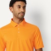 image:imageAmazon Essentials Mens RegularFit QuickDry ShortSleeve Golf Polo ShirtApricot Orange