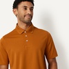 image:imageAmazon Essentials Mens RegularFit QuickDry ShortSleeve Golf Polo ShirtCaramel