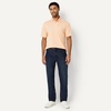 image:imageAmazon Essentials Mens RegularFit QuickDry ShortSleeve Golf Polo ShirtPale Peach