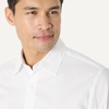 image:imageAmazon Essentials Mens Regular Fit Long Sleeve Wrinkle Resistant Stretch Dress ShirtWhite