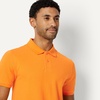 image:imageAmazon Essentials Mens SlimFit ShortSleeve Cotton Pique Polo ShirtApricot Orange